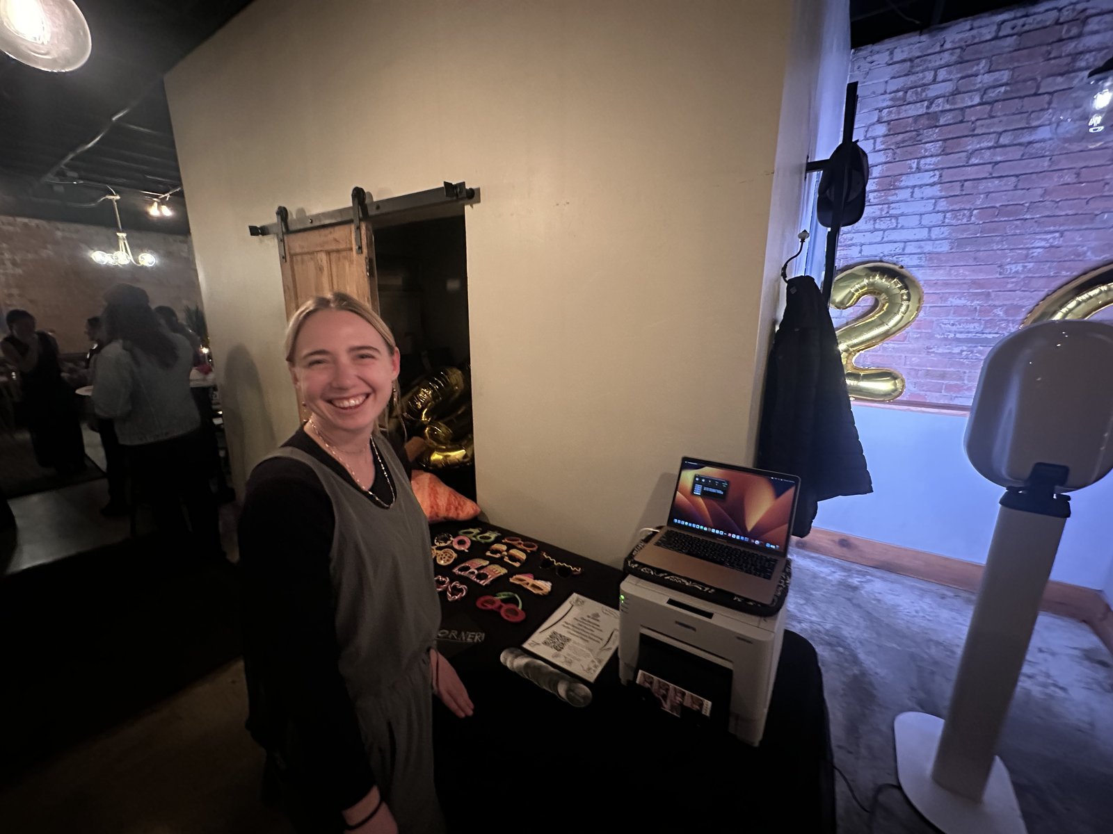 Gwen running the Salt Booths photo booth and printer at a live event in Utah